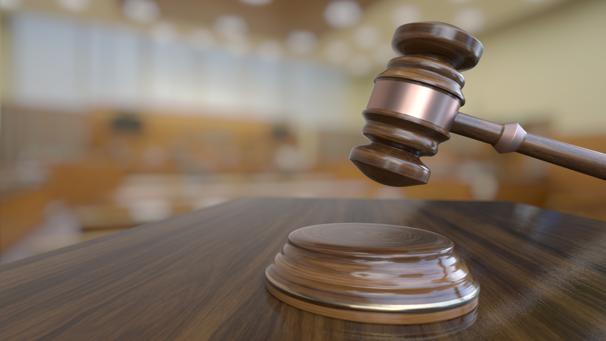 Wooden judge gavel, close-up view.