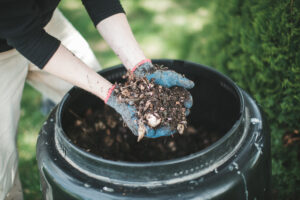 Man showing compost