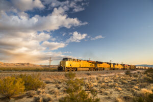 Cargo train rolls through the desert