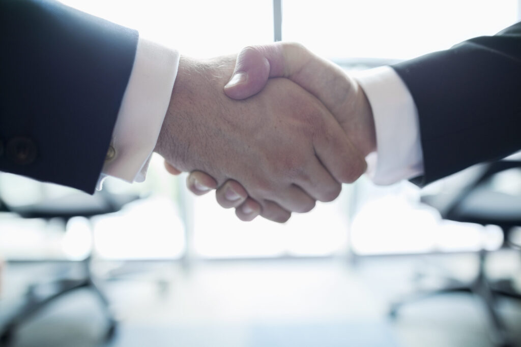 Handshake in an Office