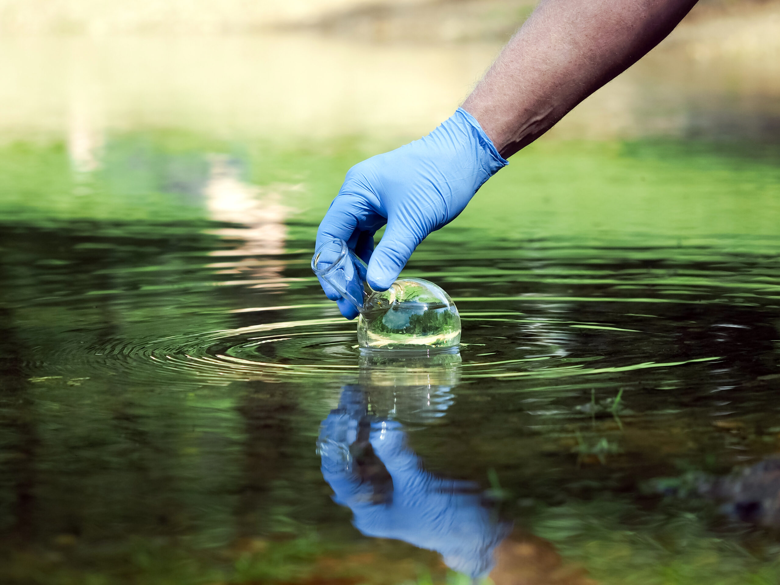 Hand in glove collects water to explore