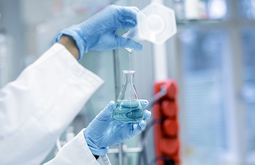 Scientist working with chemicals for research in a lab