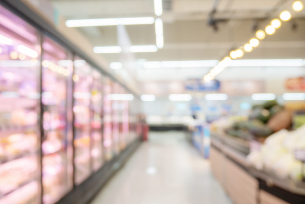 supermarket grocery store aisle and shelves blurred background